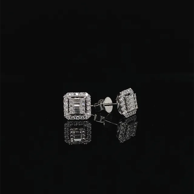 A pair of diamond stud earrings with baguette halos