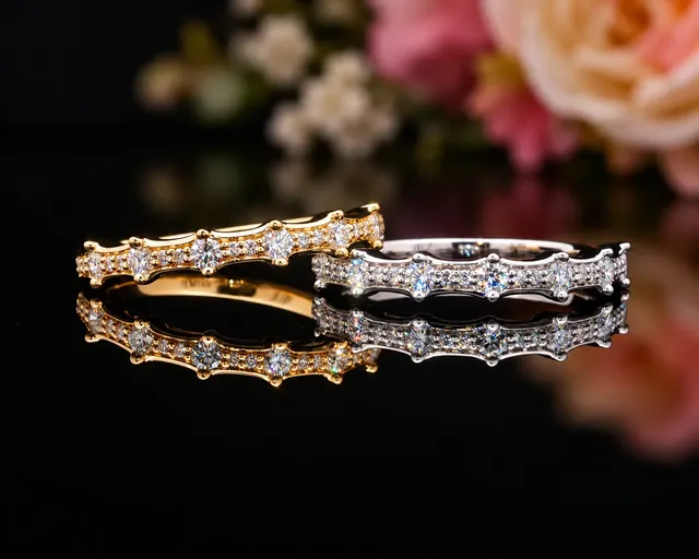 Two scalloped diamond bands, one yellow gold and one white gold
